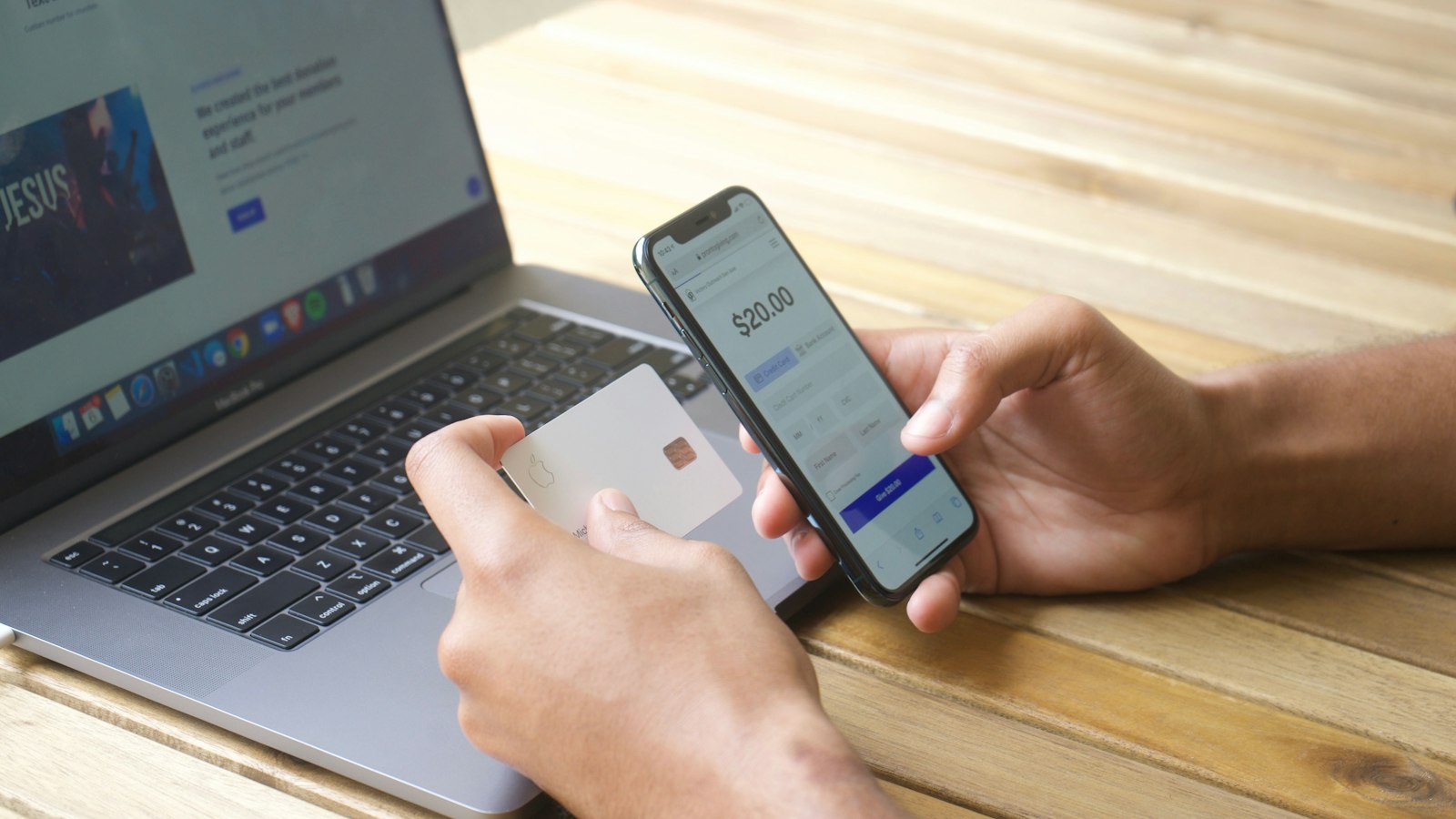 Smartphone, bank card and laptop